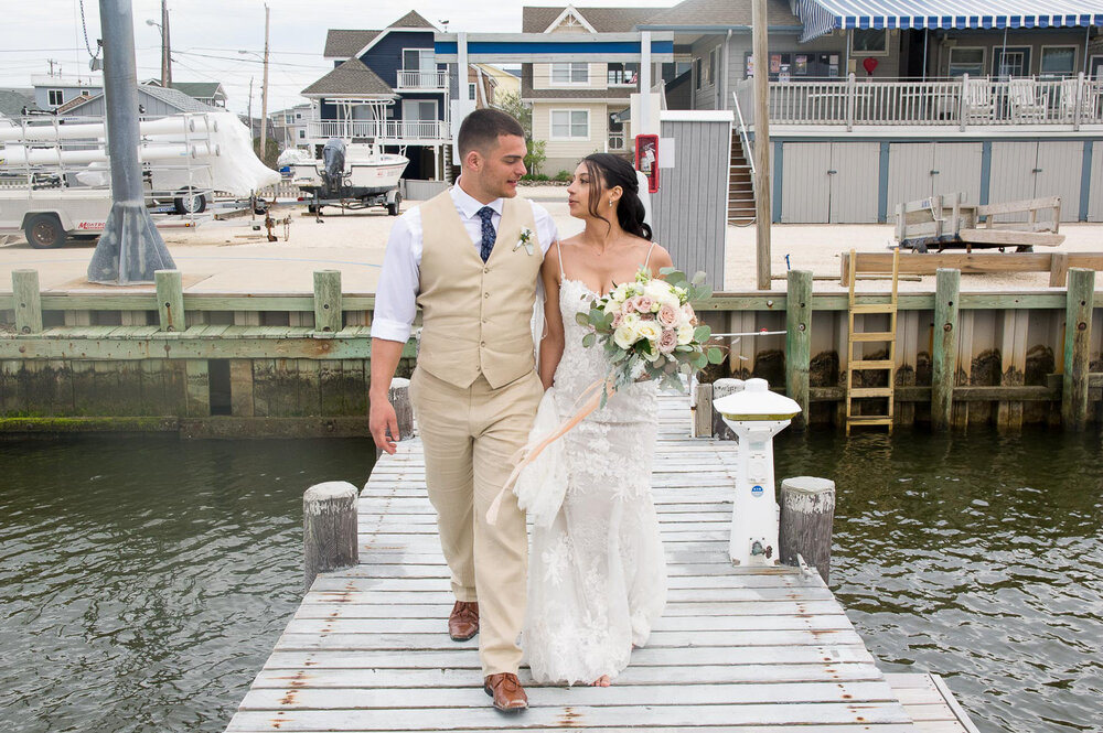 Jenna and Rick taking a stroll after their Brant Beach Yacht Club Wedding